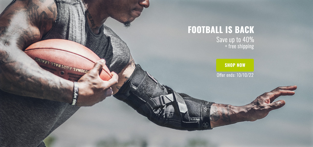 Football is Back! Save up to 40% + Free Shipping - athlete wearing elbow brace running with football
