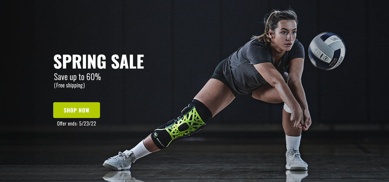 Spring Sale - Save up to 60% - athlete wearing kneee brace playing volleyball